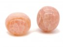 Two peach-coloured, pierced agate rondels
