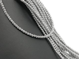 Shiny spheres of hematite in grey