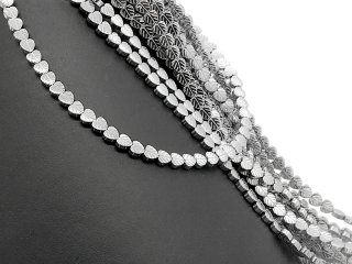 Leaf-shaped haematite stones in grey