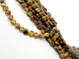 Pierres précieuses percées chatoyantes en œil de tigre
