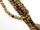 Shimmering pierced tiger eye gemstones