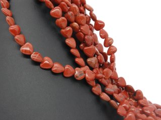 Cœurs de jaspe rouge brique percés