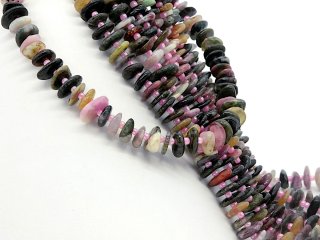 Colourful, faceted, pierced tourmaline discs