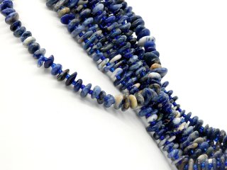 Pierced, blue and grey sodalite discs
