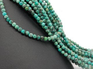 Perles de turquoise percées bleu-vert