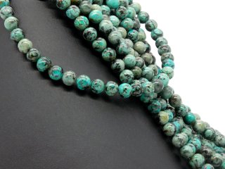 Perles de turquoise percées bleu-vert