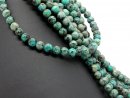 Perles de turquoise percées bleu-vert