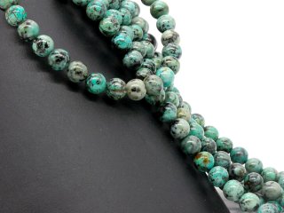 Perles de turquoise percées bleu-vert