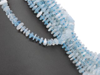 Pierced aquamarine pebbles in blue