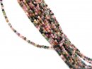 Pierced tourmaline discs with facets