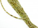 Faceted, green garnet discs