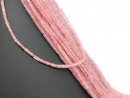 Pierced, angular quartz discs in pink