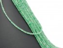 Pierced, angular quartz discs in green