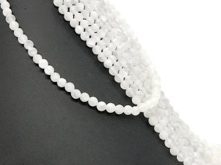 Pierced, faceted selenite beads in white
