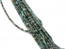 Disques de turquoise percés à motifs