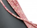 Pierced rhodonite discs in pink and sand