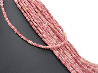 Pierced rhodonite discs in pink and sand