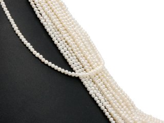 Petites perles de culture baroques percées blanches