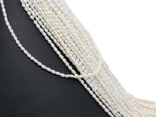 Petites perles de culture baroques percées blanches