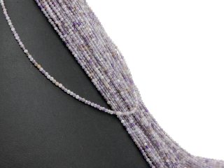 Faceted, pierced amethyst beads