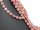 Pierced rhodonite discs in pink and sand