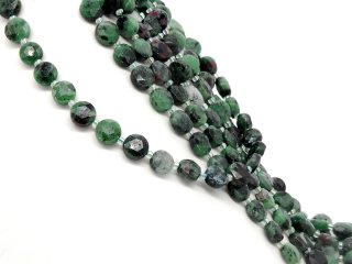 Faceted anyolite discs in black, magenta and green