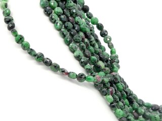 Faceted anyolite discs in black, magenta and green