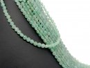 Green, faceted, pierced aventurine discs