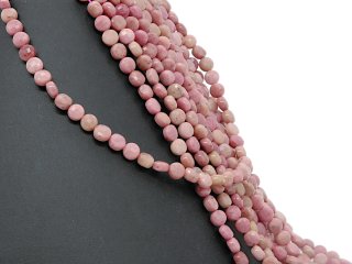 Pierced rhodonite discs in pink and sand