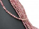 Disques de rhodonite percés en rose et sable