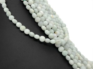 Light-coloured, faceted, pierced angelite discs