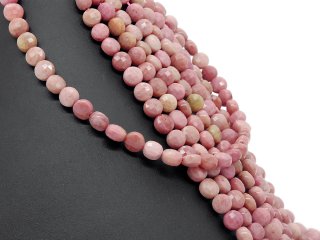 Pierced rhodonite discs in pink and sand