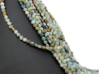 Pierced, colourful chrysoprase rondelle with facets