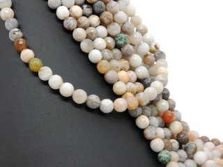 Brown, white and grey moonstones with facets