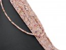 Durchbohrte Pinkopal-Würfel in Rosa und Honiggelb