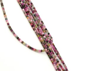 Colourful, faceted, pierced tourmaline cubes