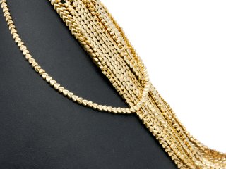 Pierced, sparkling, golden haematite hearts