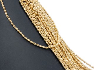 Pierced, sparkling, golden haematite olives