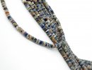 Pierced, blue and grey sodalite discs