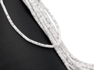 Pierced, white howlite discs with grey marbling