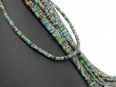 Turquoise-coloured, patterned, pierced turquoise discs