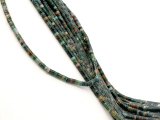 Colourful, pierced moss agate discs