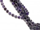 Funkelnde, durchbohrte Amethystscheiben