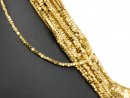 Pierced, sparkling, golden haematite cubes