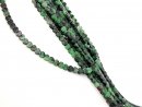 Faceted anyolite discs in black, magenta and green
