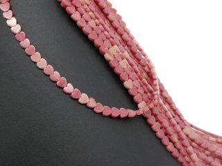 Pierced rhodonite discs in pink and heart shape