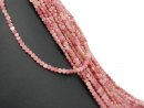 Pierced rhodonite discs in pink and heart shape