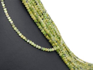Pierced heart-shaped jasper discs in green