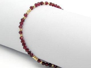 Bracelet rouge avec boules de grenat à facettes
