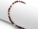 Red bracelet with faceted garnet beads